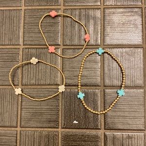 E newton cross bracelet set